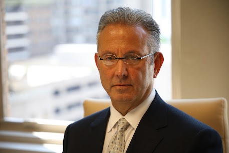 Dog Bite Lawyer Jeffrey Penneys Facing Camera Wearing Glasses with Charcoal Suit