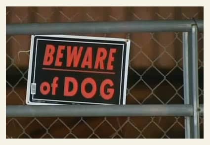 Beware of Dog sign on fence
