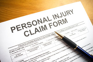 Completing a Personal Injury Claim form with help of dog bite attourney Jeffery H. Penneys